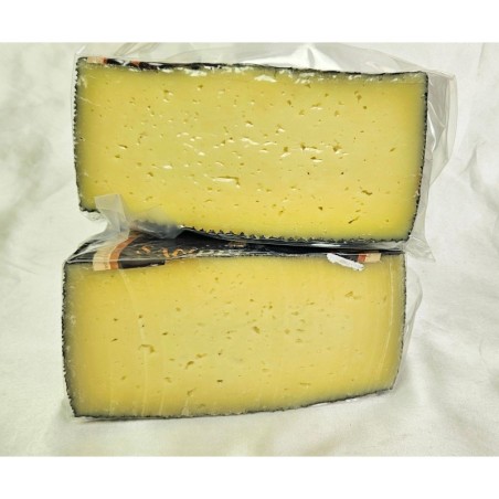 Medio queso manchego semicurado El Abuelo Artesano | Jamones El Chulo